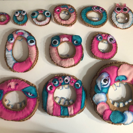 Dirty Dozen (stand and 12 donut plush figures)